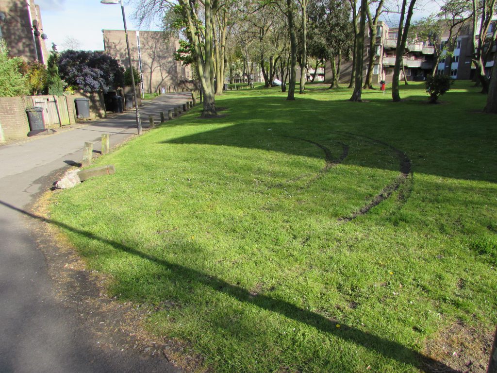 While the bollards were missing vehicles were driven over the grass