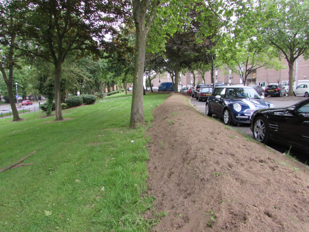 The bund covered in topsoil and seeded